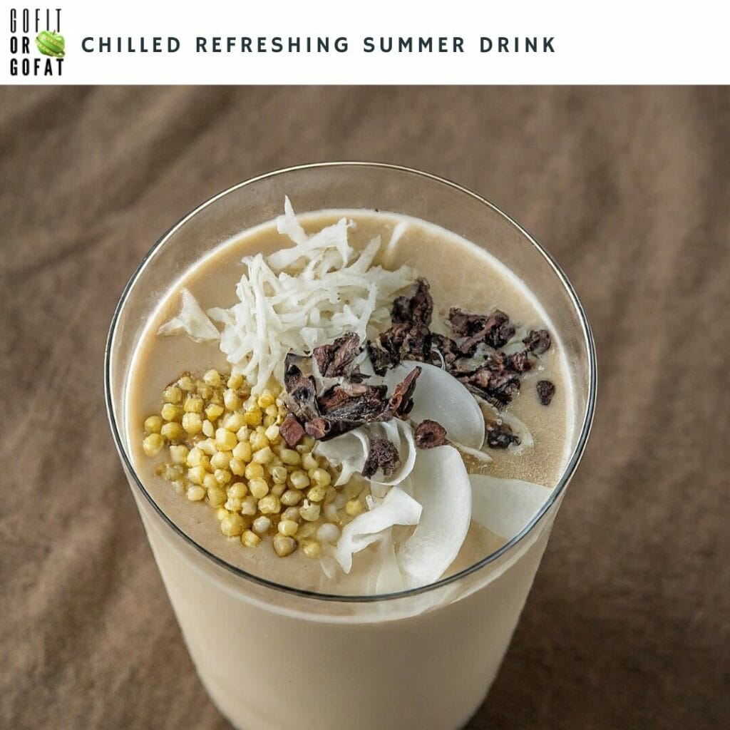 Chilled refreshing summer drink: Brown Top Millet Milk served with toppings such as shredded coconut, chopped nuts, or a sprinkle of cocoa nibs for extra texture and flavor